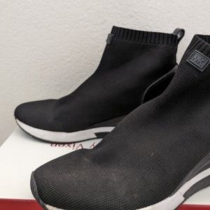 Worn Black Michael Kors shoes